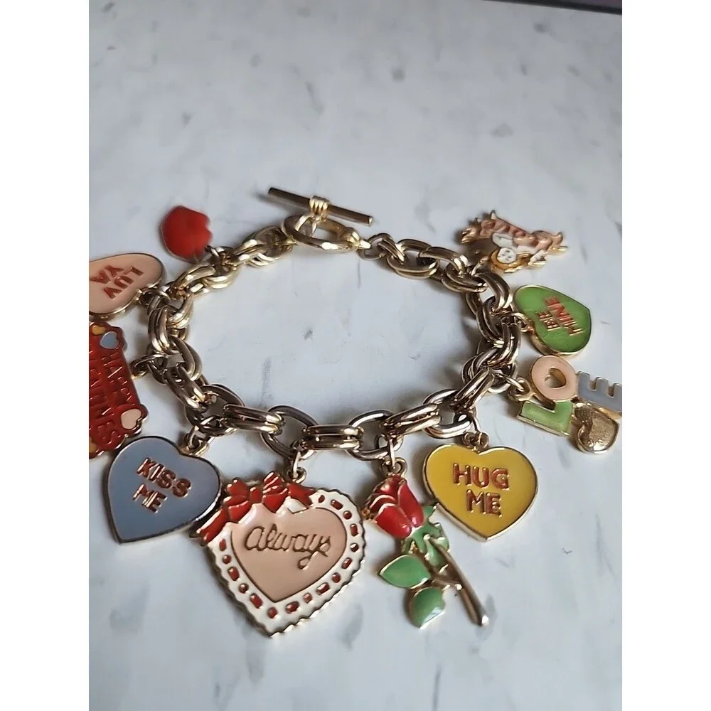 Charm Braclet, Love, Valentine's Day, Hearts, Hugs and Kisses Gold Tone Braclet.